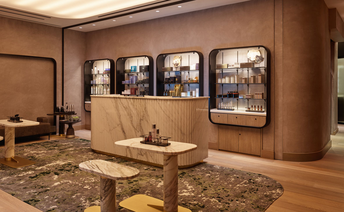 Espresso walls with marble counter and product display