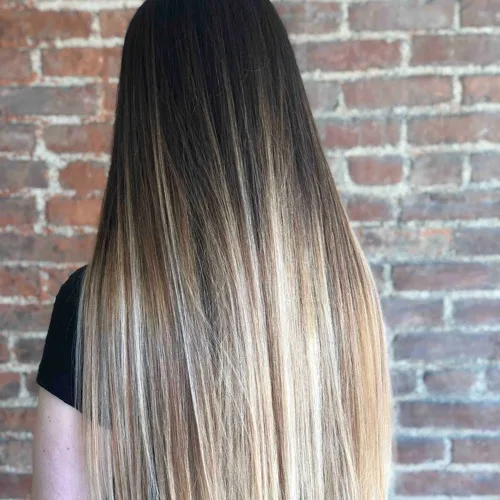 Dimensional balayage, dark root melted into sandy blonde