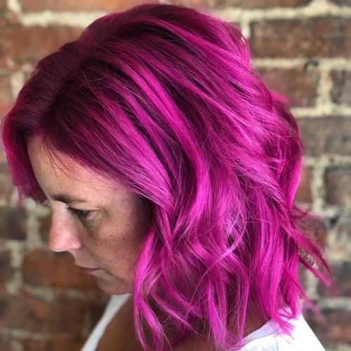 Vivid magenta, bold all-over color with soft waves