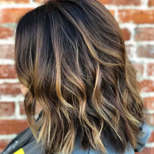 Warm caramel highlights on a dark base, soft layers