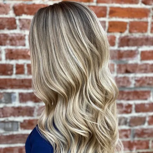 Dimensional blonde with soft lowlights and beachy waves