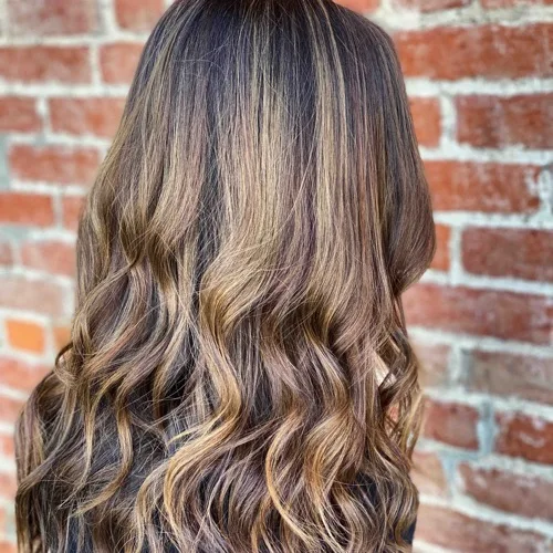Soft dimensional highlights on a brunette base