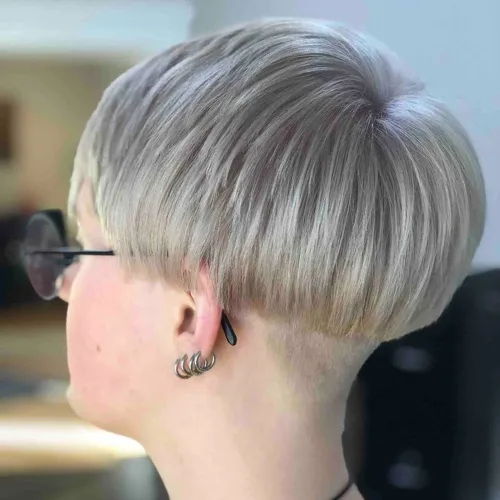 Polished silver-blonde pixie with clean tapered lines